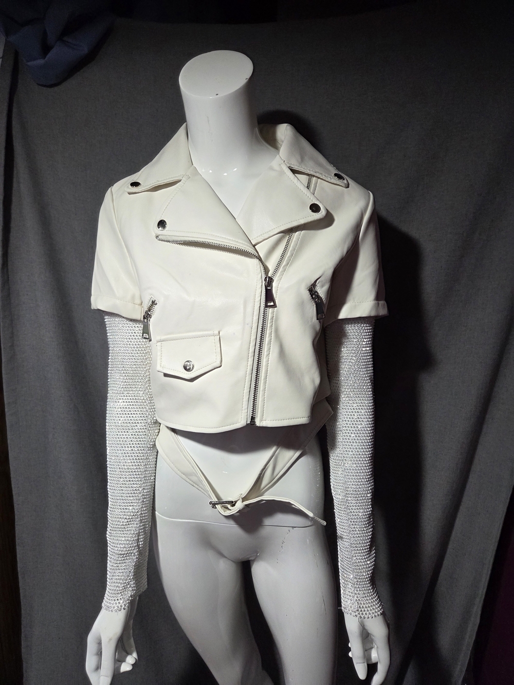 Cropped White Faux Leather Moto Jacket with Knit Sleeves